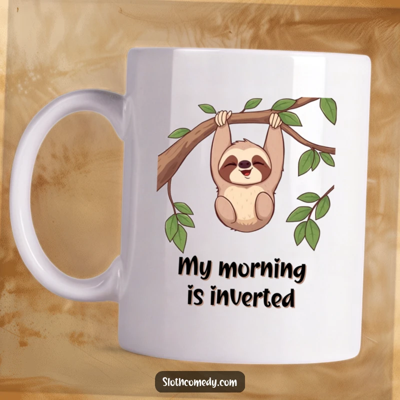 Funny mug featuring a sloth giggling while hanging upside down from a branch, radiating happiness and relaxation.