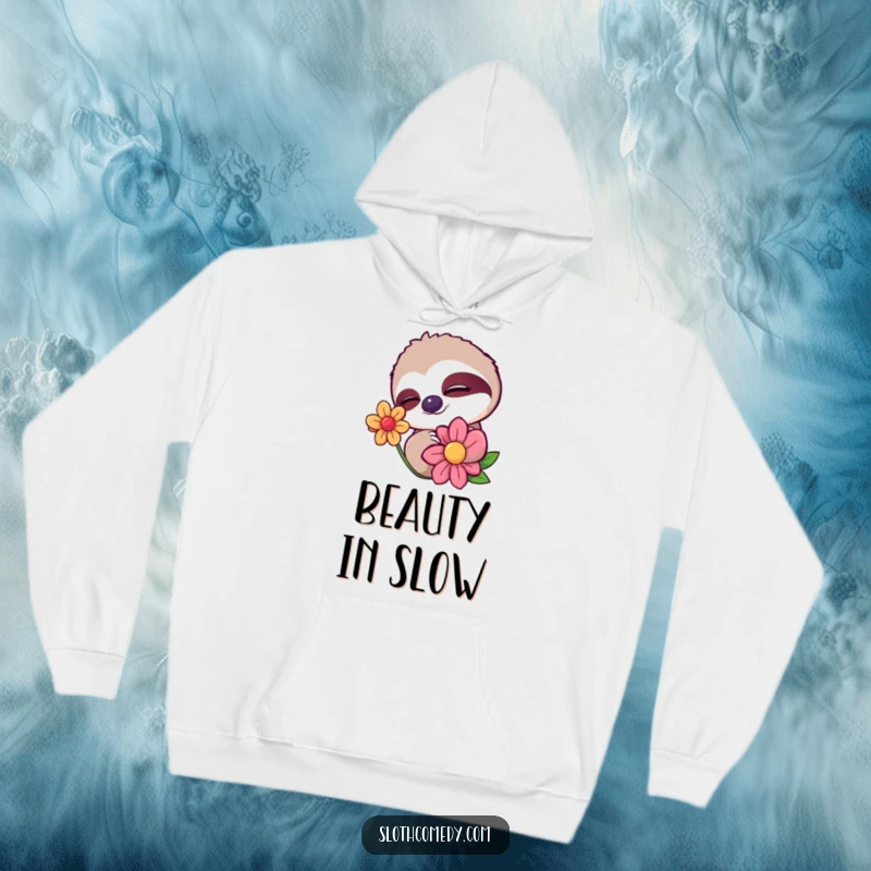 Funny hoodie with a sloth character giving a sleepy wink while slowly blinking at a colorful flower. A cozy and humorous design.