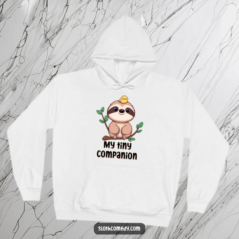 Funny sloth hoodie, a cozy sweatshirt featuring a sloth peacefully hosting a tiny, cheerful bird on its head.