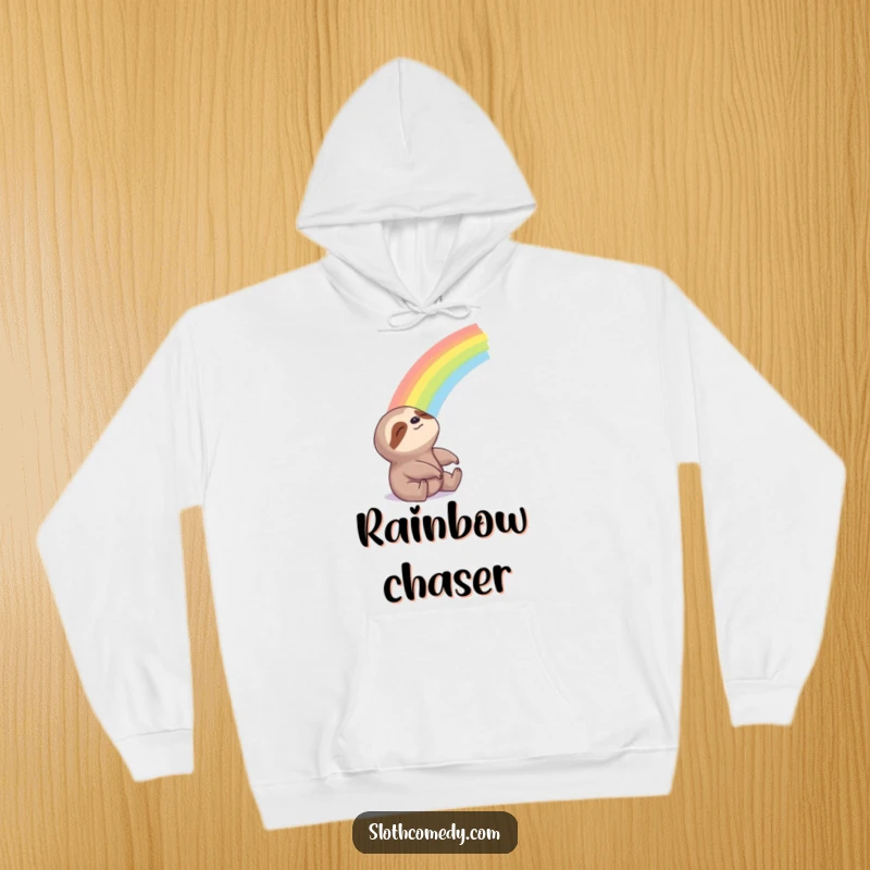 Funny Hoodie showcasing a sloth’s blissful gaze at a beautiful rainbow, symbolizing hope and cozy dreams.