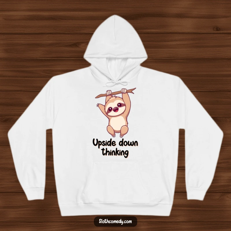 Funny Hoodie: A kawaii sloth hangs upside down, arm extended, in a unique pose, offering comfort and humor, a funny gift.