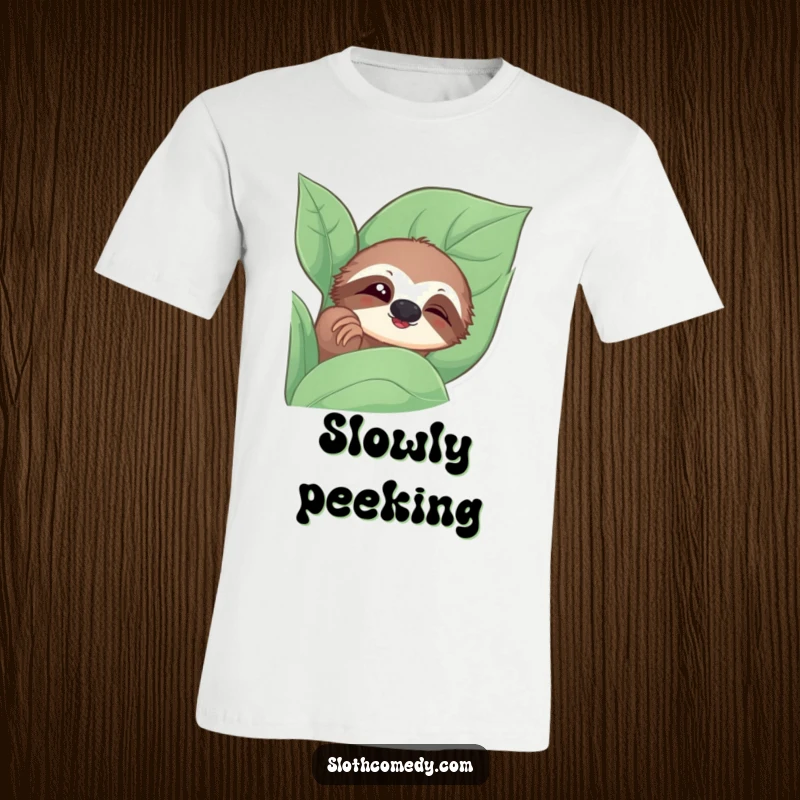Funny t-shirt with a sloth peeking from a leaf, giving a slow blink, representing curiosity and calm.